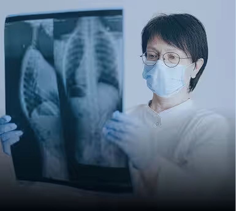 A physician reviewing diagnostic imaging
